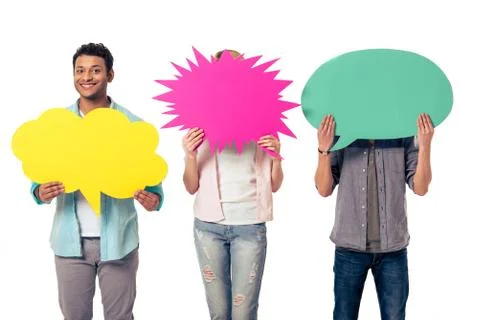 Young people with speech bubbles Stock Photos