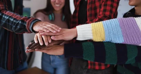 Young people stacking hands together - Lifestyle and school concept Stock Footage 164378077