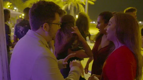 Young People Talking and Socializing at Nightclub Event 動画素材 344604618
