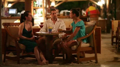 Young people talking in bar Stock Footage 10788805