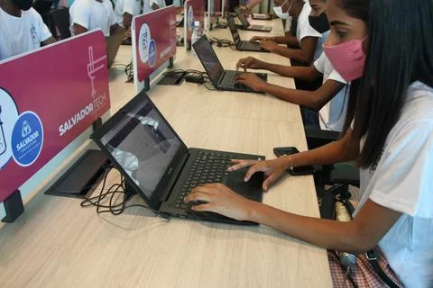 Young people using computer in social project Stock Photos