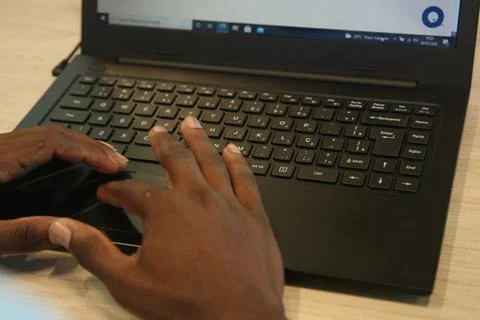 Young people using computer in social project Foto stock