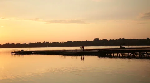 Young people walking down the pier Stock Footage 44413969