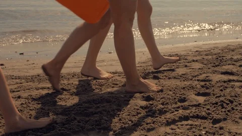 Young people walking at the seaside Stock Footage 95226739