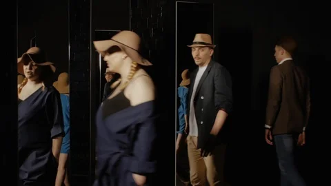 Young people walking through the mirrors Stock-Footage 106978137