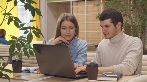 Young people work at the hub Video stock 76323889