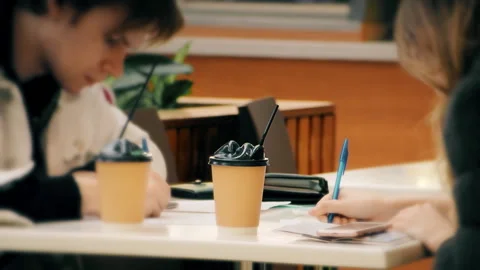 Young people working at cafe. Stock Footage 103845532