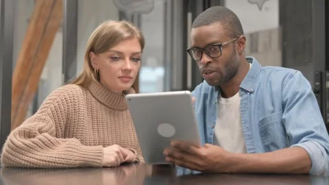 Young People Working on Tablet in Office Stock Footage 302871817