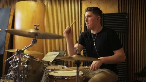 Young Percussionist Playing a Drum Set Stock Footage 72192453