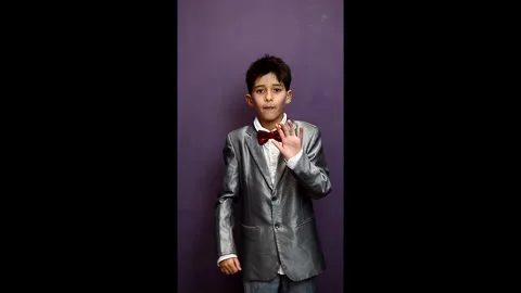 Young performer expressing emotions with gestures and speech Stock Footage 296923141