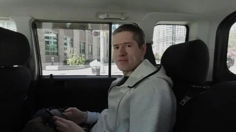 Young Person Actively Using Smartphone While Seated Inside Cars Interior Space 스톡 동영상 291638244