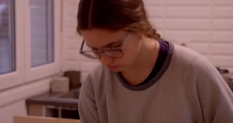 A young person engrossed in work Video stock 331399925