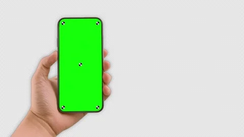 Young person hand using smartphone with green mock up screen chroma key Stock Footage 306170435