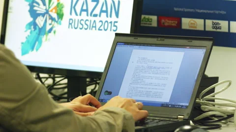 Young person studies electronic document on laptop Stock Footage 237177807