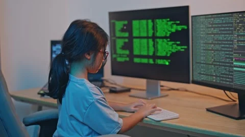 Young person working on programming code and data analysis in a modern work.. Stock Footage 319823379