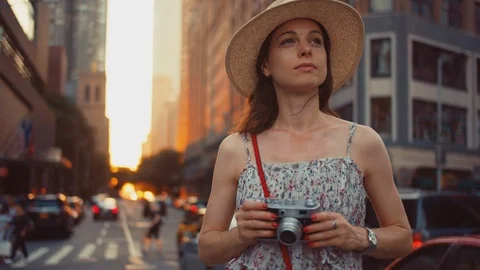 Young photographer with a camera in NYC Stock Footage 120359435