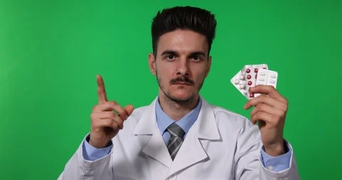 Young Physician Man Show Tablets Pills Disagree Gestures Green Screen Background Stock Footage 87939633