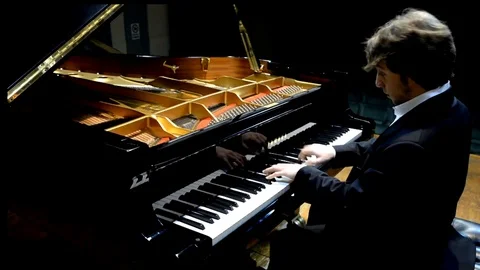 Young pianist execution classical Bach1 Video stock 71193943