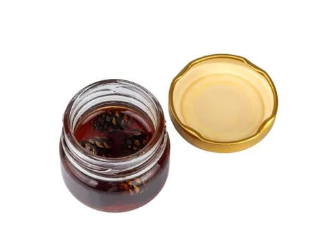 Young pine cones jam in a jar Stock Photos