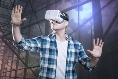 Young player exploring a new virtual game Stock Photos