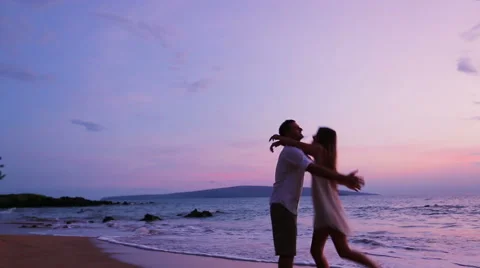Young Playfull Couple on Beach Stock Footage 52552503