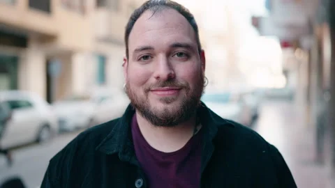 Young plus size man smiling confident standing at street Video stock 171816506