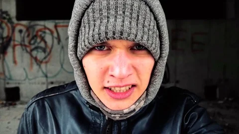 Young poor man screaming into the camera Stock Footage 82794663