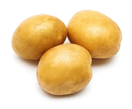 Young potatoes isolated on white background. Harvest new. Flat lay, top view Stock Photos