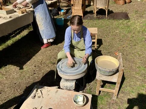 Young potter working Stock Photos