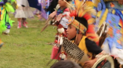 Young pow wow dancer does sneak up dance Stock Footage 47623516