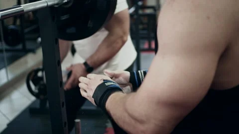 Young powerlifter in gym 動画素材 148296195