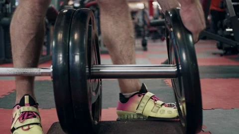 Young powerlifter in gym 動画素材 148296417