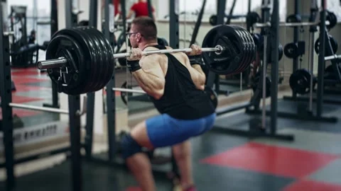 Young powerlifter in gym 動画素材 148296490