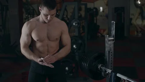 Young powerlifter in gym Stock Footage 149948081