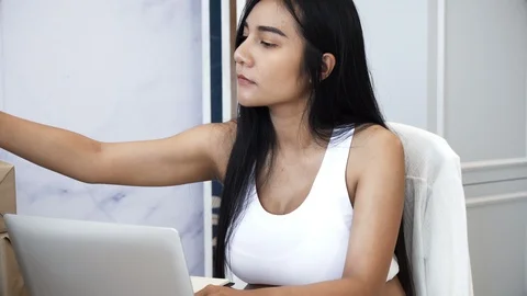 Young pregnant checking the package on table Stock Footage 87247679