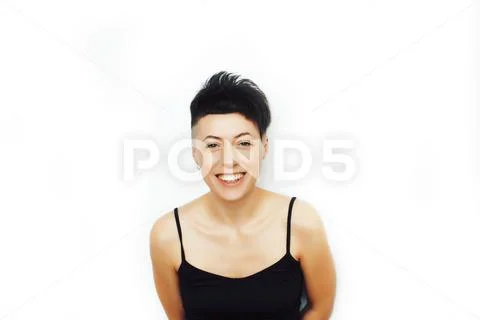 Young pretty brunette girl with modern short haircut posing cheerful smiling Stock Photos