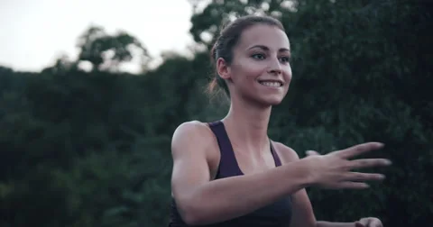 Young pretty female dancer practising dance in nature 4K 動画素材 54800642