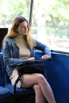 Young pretty passenger at the public transport 写真素材