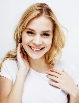 Young pretty stylish hipster blond girl posing emotional isolated on white Stock Photos