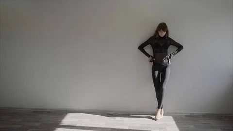 Young pretty woman dancer practice in the studio slow motion Stock Footage 70779964