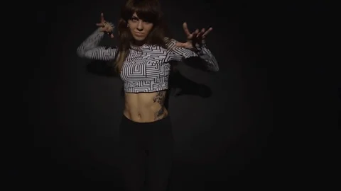 Young pretty woman dancer practice in the studio slow motion Stock Footage 70787441
