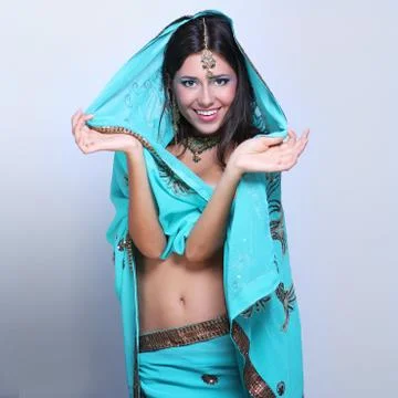 Young pretty woman in indian turquoise sari Stock Photos