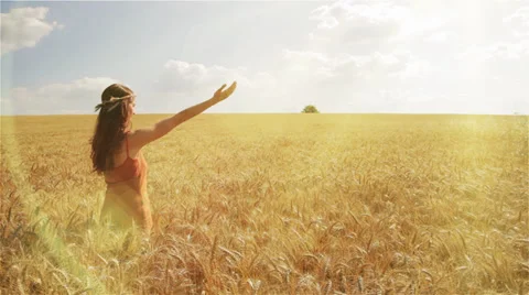 Young Pretty Woman Raising Hands Sun Flare Worship Pose background HD Stock Footage