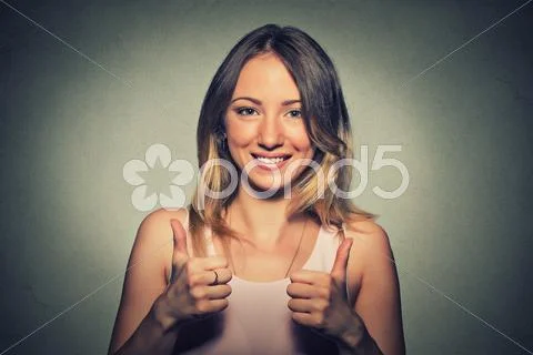 Young pretty woman with two thumbs up sign gesture Stock Photos