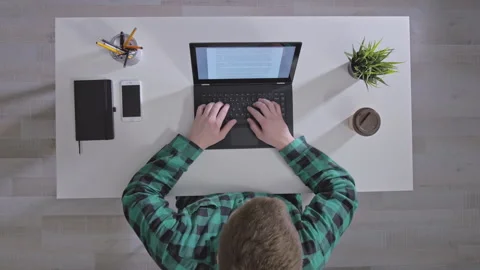 Young professional doing his work project at home Stock Footage 143120962