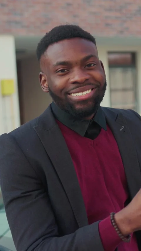 A Young Professional Engaged Seamlessly with Their Smartphone in an Urban Stock Footage 304492013