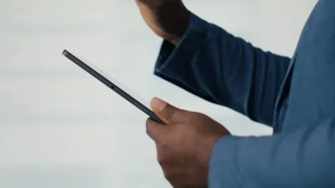 Young professional engineer focused on coding with tablet at an innovation hub Stock-Footage 312293157