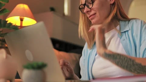 Young professional focus on laptop screen, work remotely  home office, warm.. Stock Footage 309040931