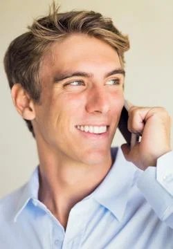 Young professional, handsome man using smart mobile phone Stock-Fotos