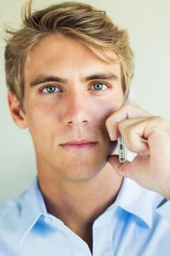 Young professional, handsome man using smart mobile phone Stock-Fotos